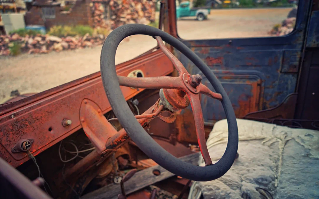 Inside view of a deteriorated junk car, ideal for scrap car removal and recycling in Ontario
