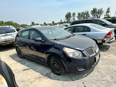 cash for scrap cars North York Dark blue Pontiac Vibe scrap car sold for cash in North York, Toronto