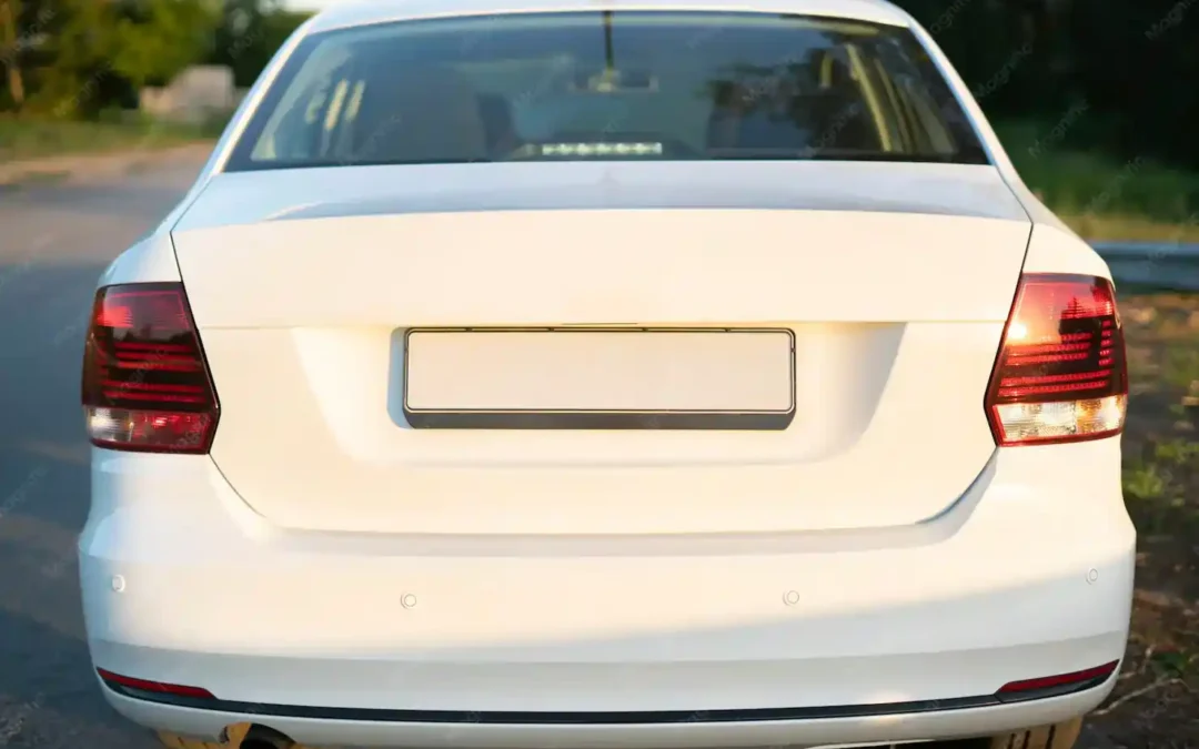 Rear view of a white car with a blank licence plate, representing a lost or missing plate in Ontario